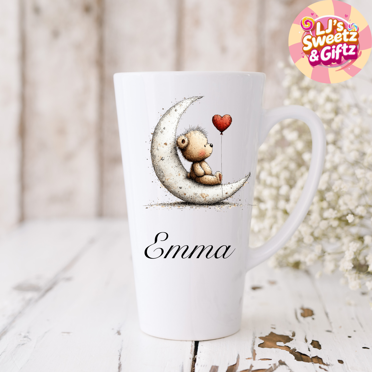 White mug with teddy bear on a moon design and 'Emma' text, branded 'Li's Sweetz & Giftz'.