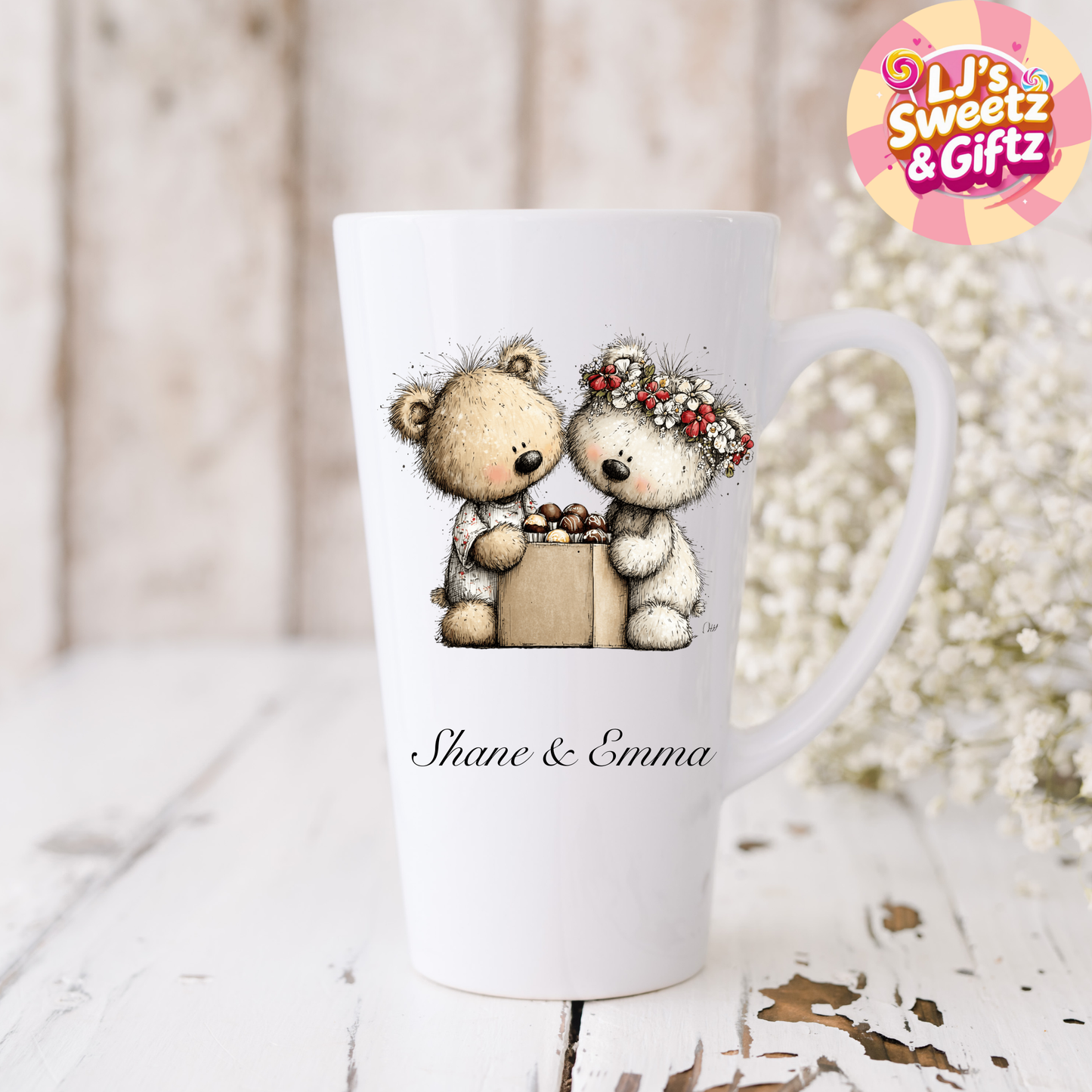 White mug with teddy bear design and 'Shane & Emma' text, featuring 'Lj's Sweetz & Giftz' logo.