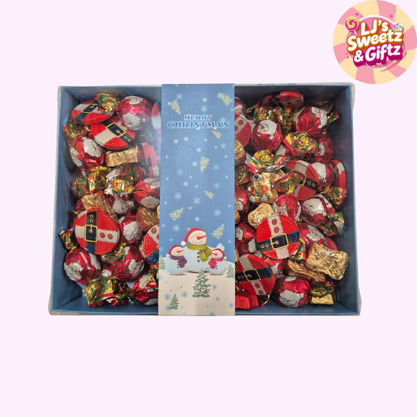Box of Christmas-themed candies with a decorative card inside, branded 'LJ's Sweetz & Giftz'.