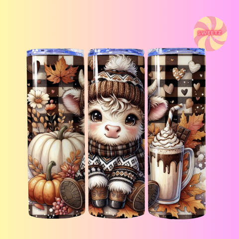 Three autumn-themed tumblers with pumpkins, a bear, and a hot chocolate design on a gradient background.