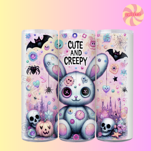 Three cylindrical containers with a cute and creepy design featuring a rabbit, pumpkins, and Halloween elements on a pastel background.