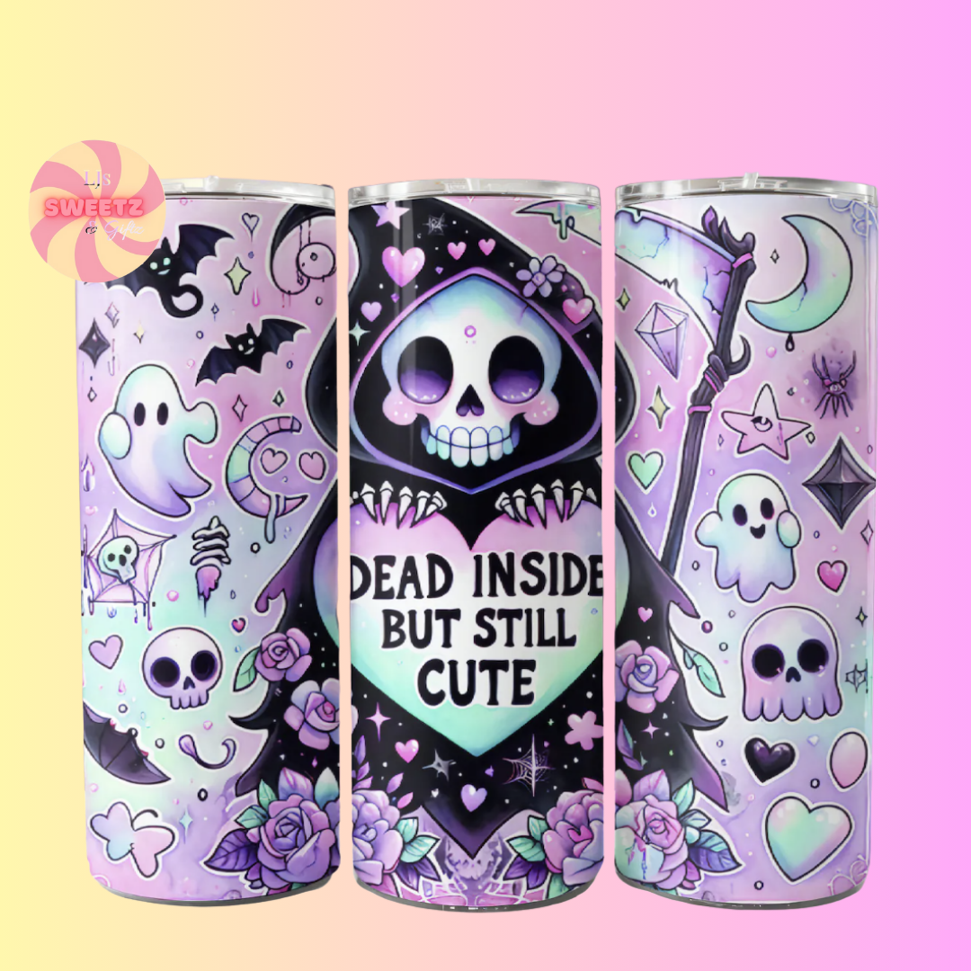 Three tumblers with Halloween-themed designs on a gradient background