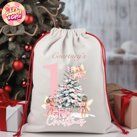 Personalized Christmas gift bag with fairies and a tree design, placed in front of a decorated Christmas tree.