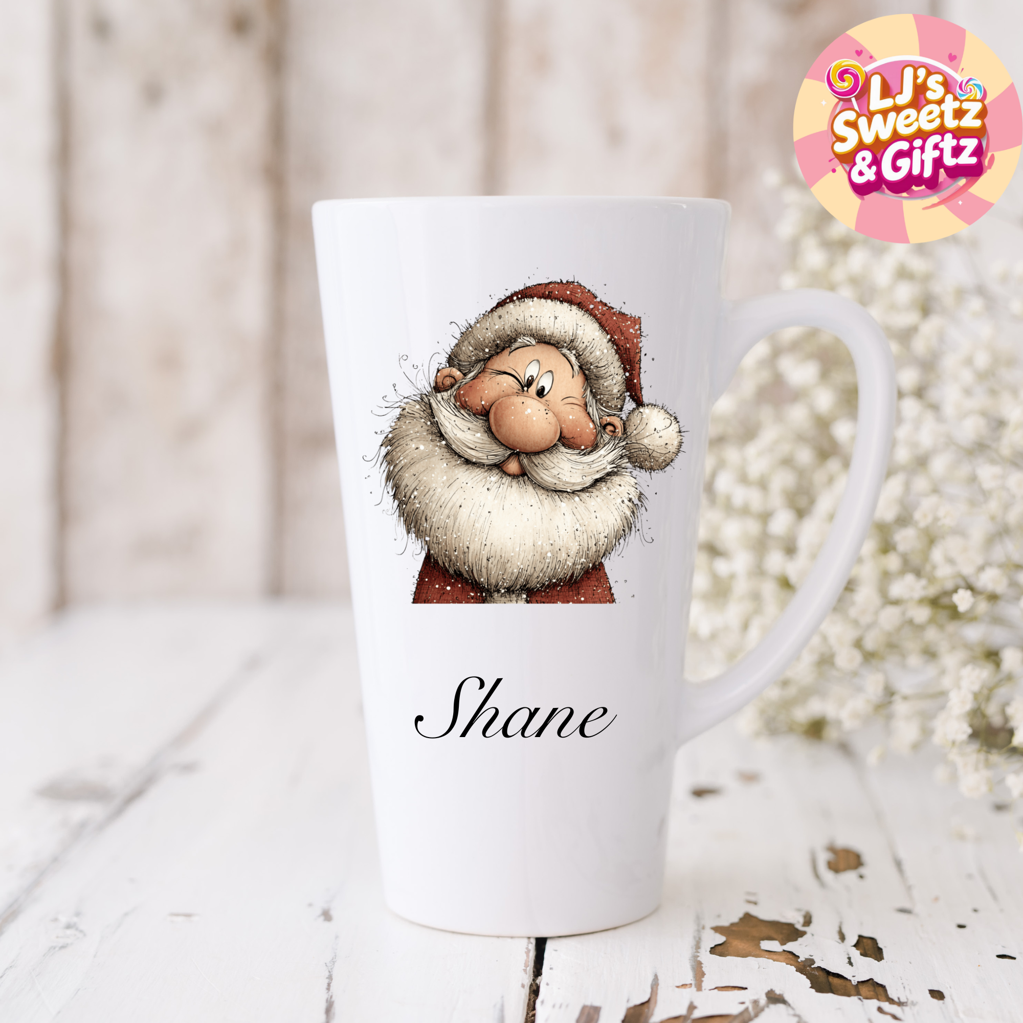 White mug with a cartoon character and 'Shane' text, branded 'LJ's Sweetz & Giftz'.