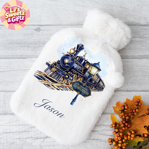 White hot water bottle with a blue train design and 'Jason' text, branded 'LJ's Sweetz & Giftz', on a wooden surface.
