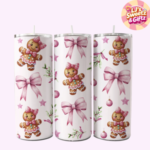Three candles with gingerbread man and bow designs on a white background, featuring the brand 'LJ's Sweetz & Giftz'.