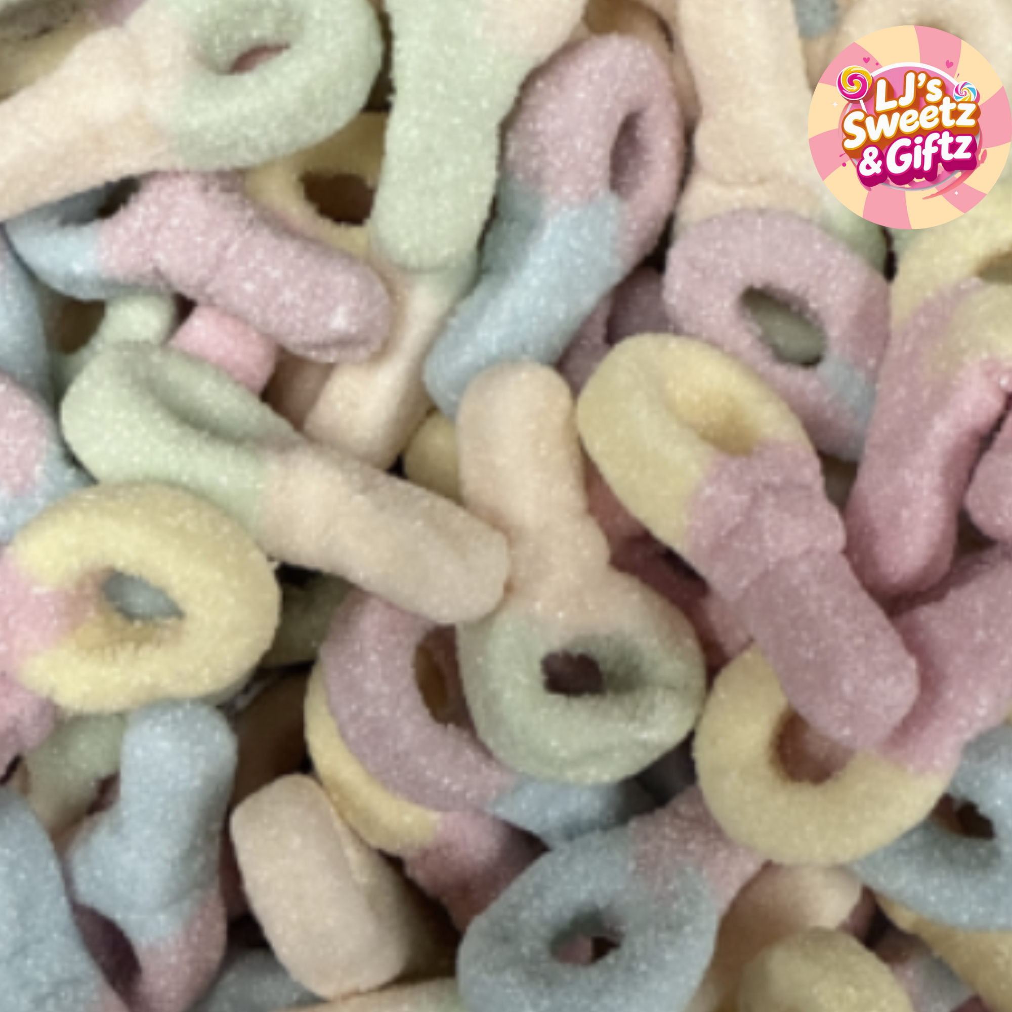 Colourful gummy candy shaped like rings with a brand logo in the corner.