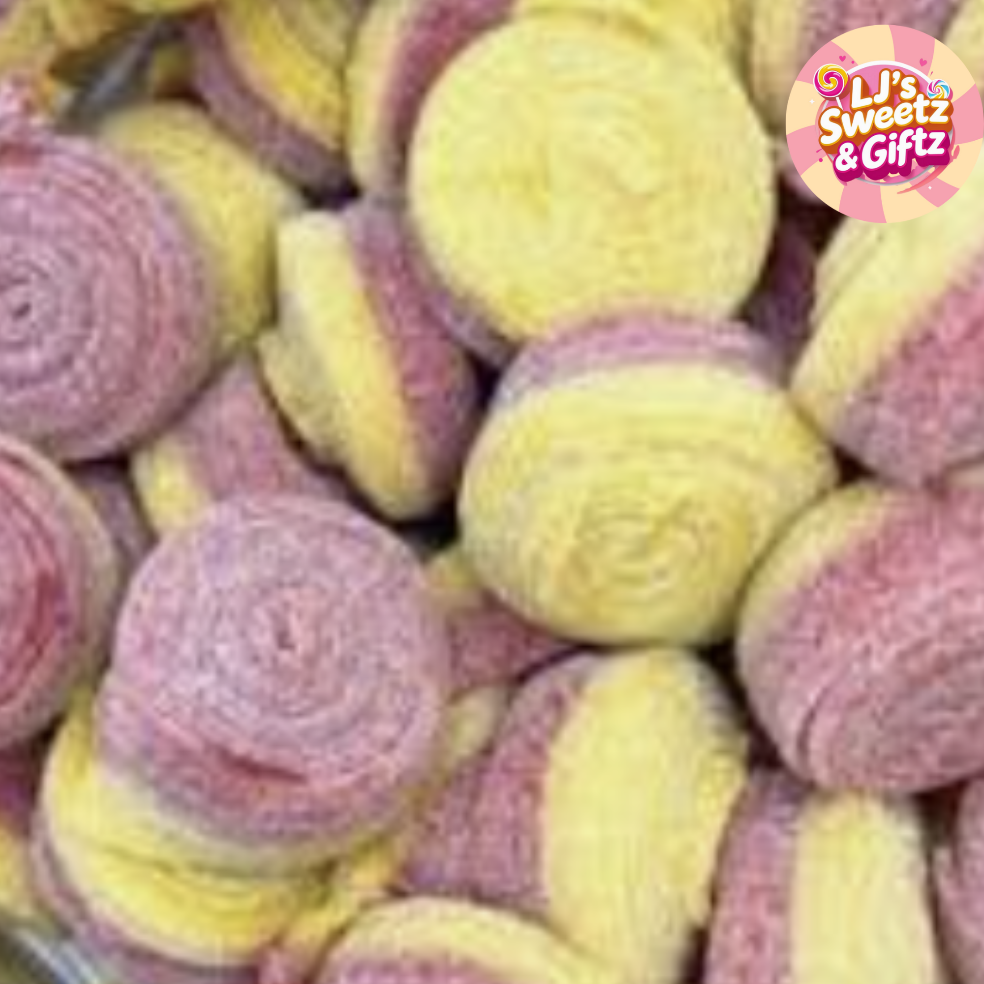 Close-up of pink and yellow candy rolls with 'LJ's Sweetz & Giftz' logo.