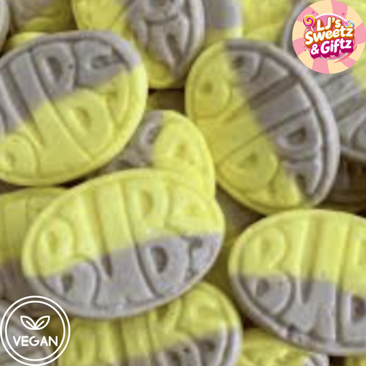 Yellow and gray cookies with 'LJ's Sweetz & Giftz' branding and a vegan logo.