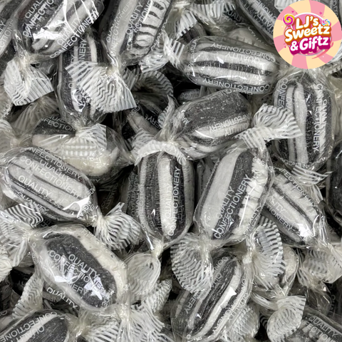 Assorted wrapped candies with a visible brand logo in the corner.